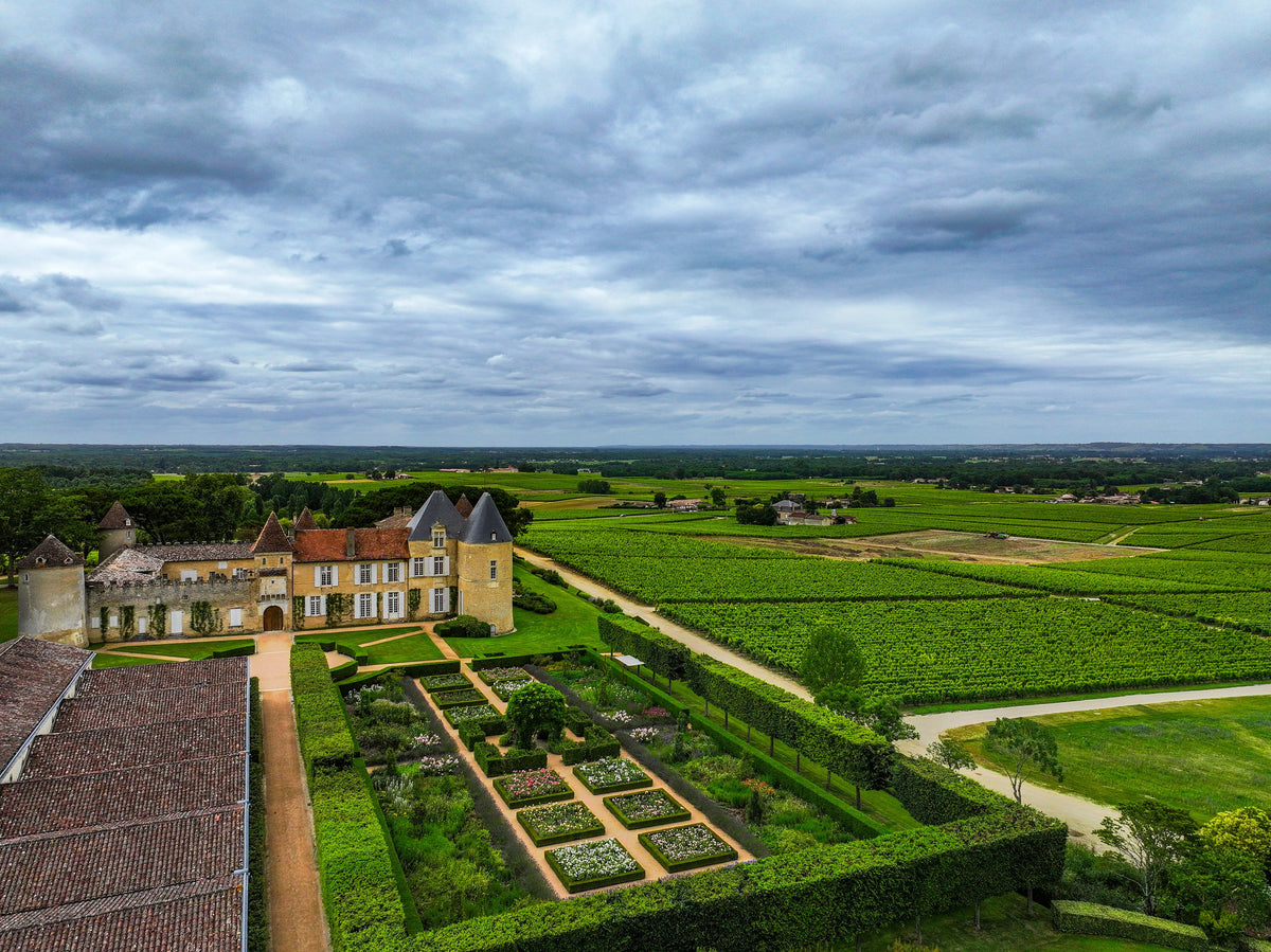 Aerial view of Château d'Yquem, its kitchen gardens and surrounding vineyards, Sauternes
